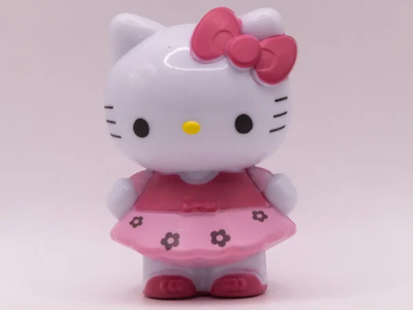 Adorable Figurine Hello Kitty en Robe Rose à Fleurs et Nœud Rose