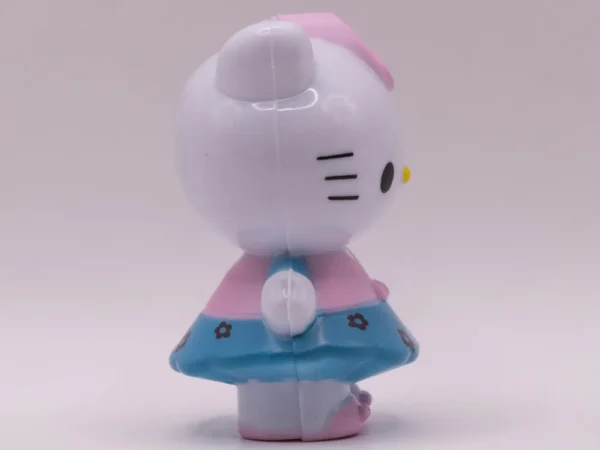 Adorable Figurine Hello Kitty en Robe Rose et Bleue