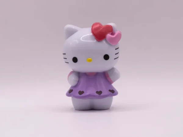 Adorable Figurine Hello Kitty en Robe Violette avec Cœur