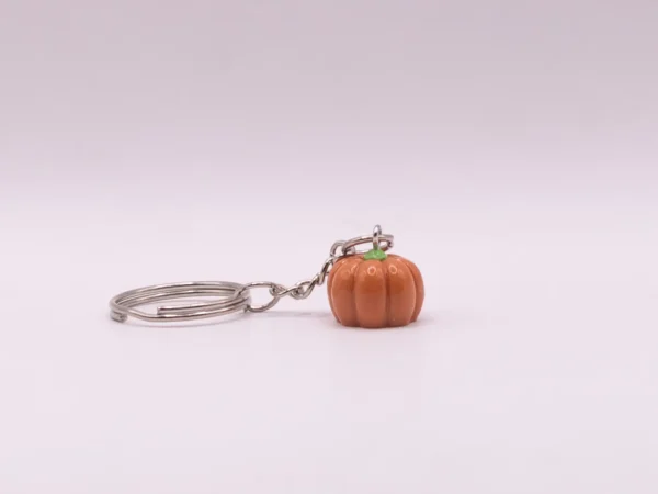Adorable Porte-clés Citrouille Orange en Plastique - Accessoire Mignon