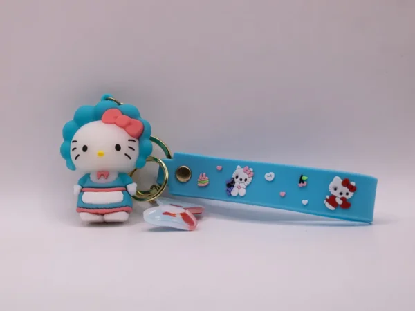 Adorable porte-clés Hello Kitty bleu et tablier, nœud rose en plastique