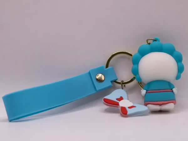 Adorable porte-clés Hello Kitty bleu et tablier, nœud rose en plastique