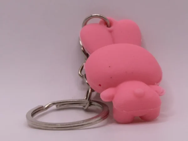 Adorable porte-clés Hello Kitty en costume de lapin rose
