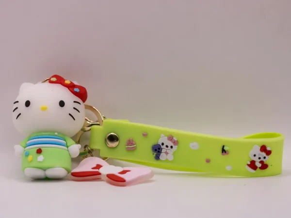 Adorable porte-clés Hello Kitty en kimono vert avec nœud rouge