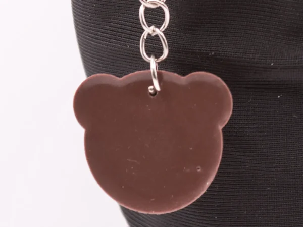 Adorable Porte-clés Ourson Marron en Plastique - Accessoire Craquant