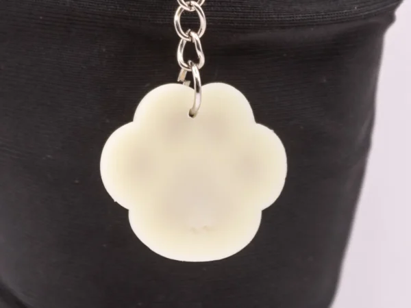 Adorable Porte-clés Patte de Chat en Plastique Beige - Empreinte Féline