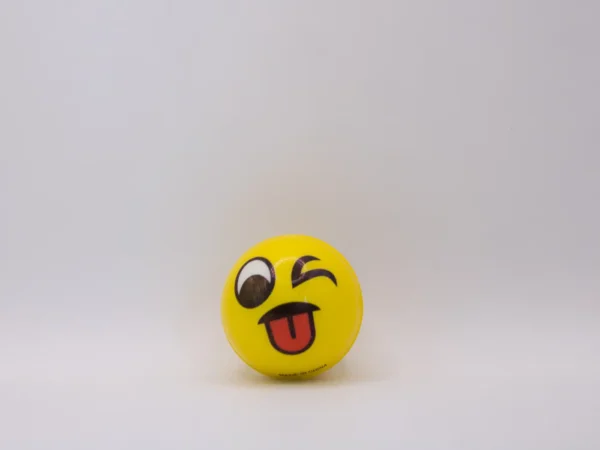 Balle Anti-stress Emoji Jaune Souriante 5cm - Défoulez-vous avec le sourire !
