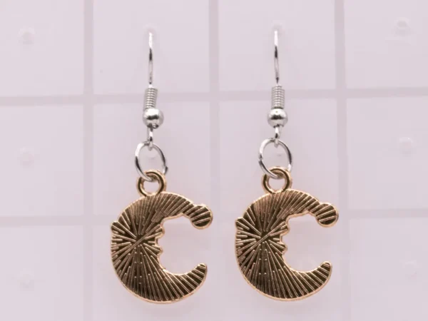 Boucles d'oreilles Lune dorée avec visage souriant Père Noël