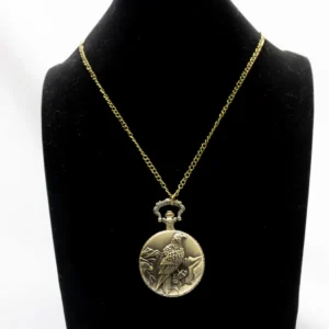 Collier montre à gousset dorée vintage avec motif aigle royal