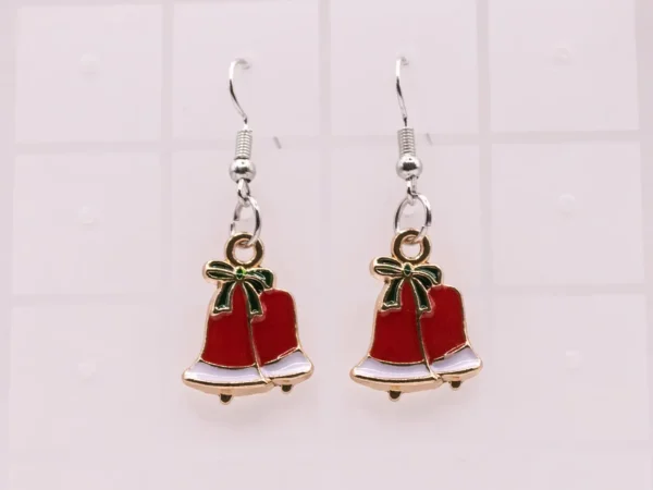 Élégantes boucles d'oreilles cloches de Noël dorées et nœud
