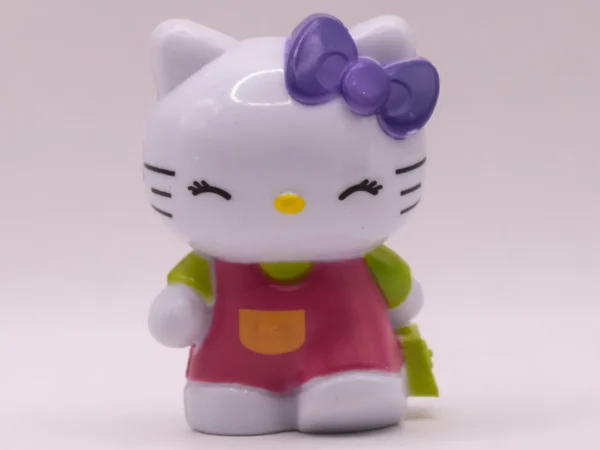 Figurine Hello Kitty Rose à Manches Vertes et Nœud Violet
