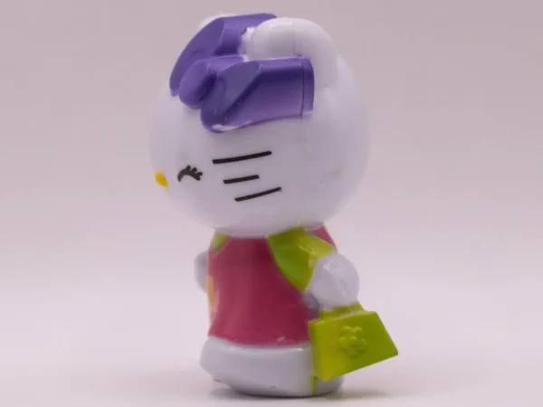 Figurine Hello Kitty Rose à Manches Vertes et Nœud Violet