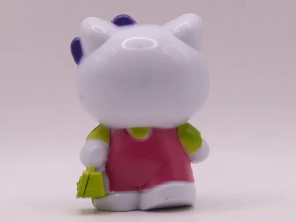 Figurine Hello Kitty Rose à Manches Vertes et Nœud Violet