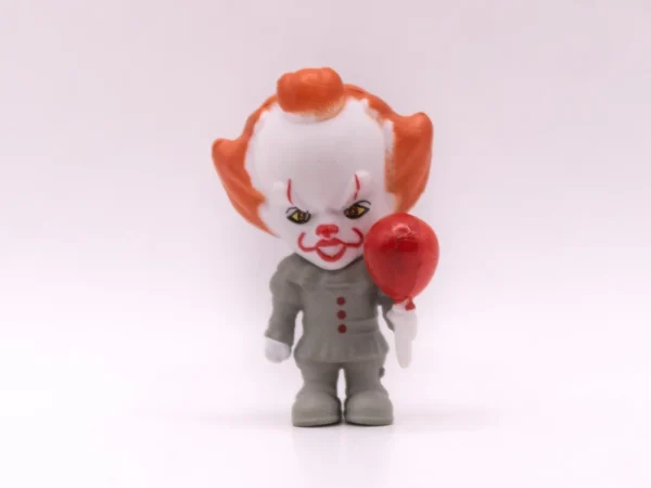 Figurine Horreur Pennywise avec Ballon - Ça - Blanche en Plastique
