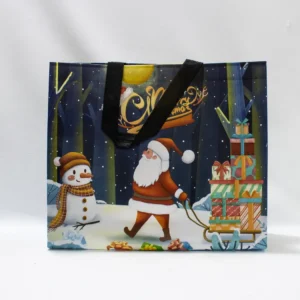 Grand Sac Cadeau de Noël Bleu Nuit et ses Motifs Hivernaux