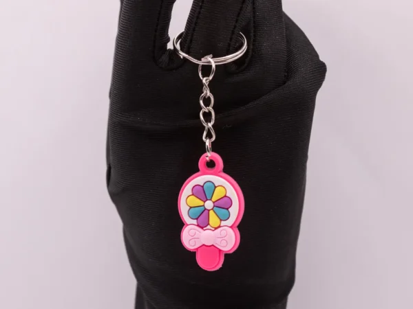 Hochet bébé coloré : nœud, fleur et amusement garanti !