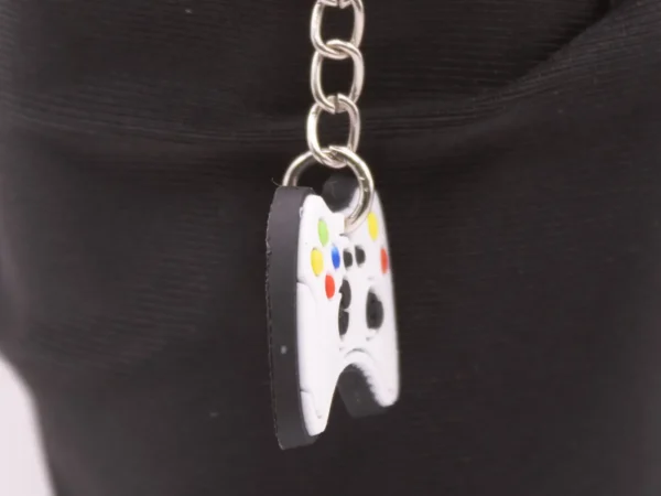 Manette Blanche Multicolore en Plastique - Design Unique et Ergonomique