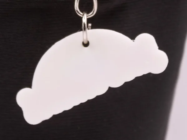 Porte-clés Arc-en-ciel "Just Smile" : Un Accessoire Coloré et Optimiste