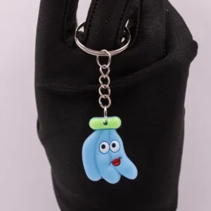 Porte-clés Banane Bleue Souriante : Un Accessoire Fruité et Amusant