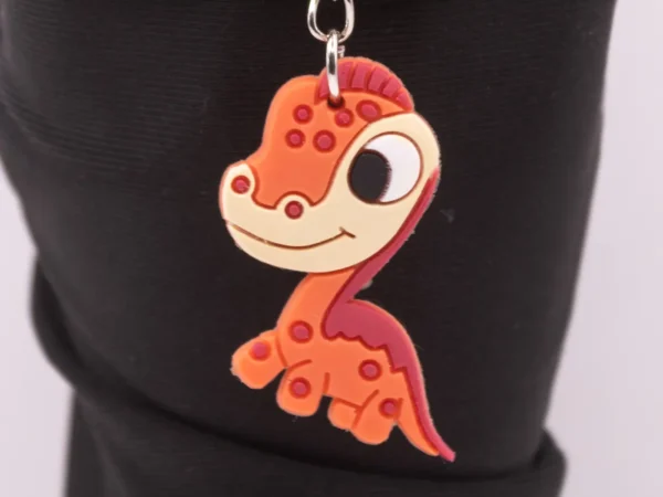 Porte-clés Dinosaure Orange vif - Accessoire préhistorique et coloré