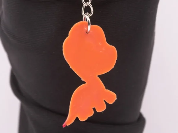 Porte-clés Dinosaure Orange vif - Accessoire préhistorique et coloré