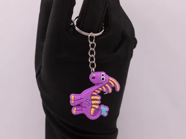 Porte-clés Dinosaure Violet - Accessoire Ludique et Coloré
