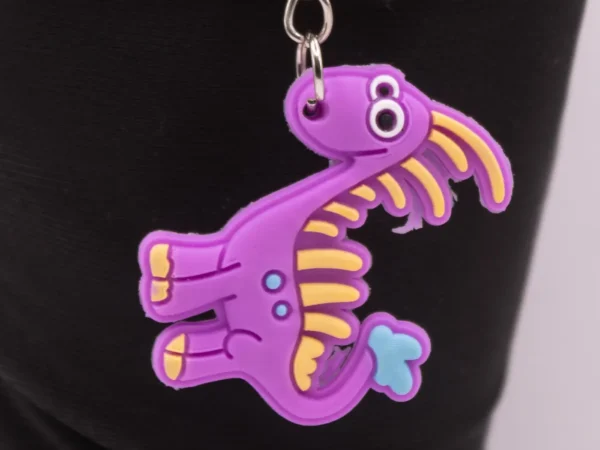 Porte-clés Dinosaure Violet - Accessoire Ludique et Coloré