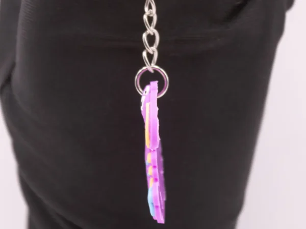 Porte-clés Dinosaure Violet - Accessoire Ludique et Coloré