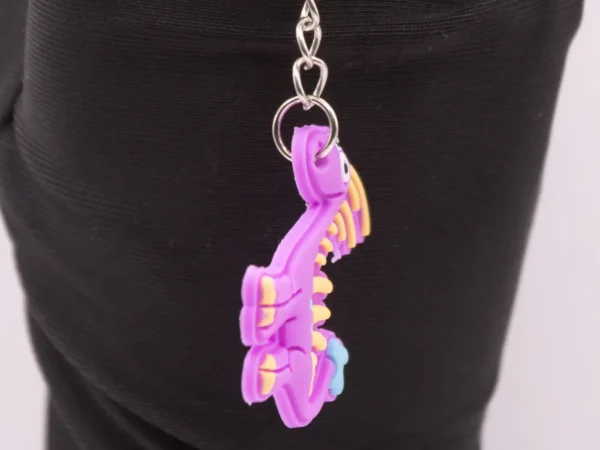 Porte-clés Dinosaure Violet - Accessoire Ludique et Coloré