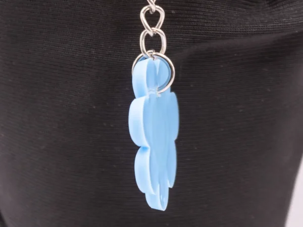 Porte-clés Fleur Bleue avec Petit Cœur en Plastique