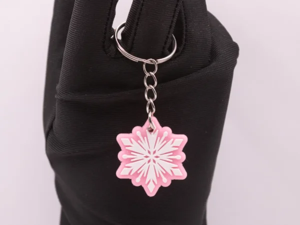 Porte-clés Flocon de Neige Rose et Blanc en Plastique