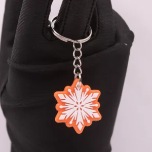 Porte-clés Flocon Orange et Blanc en Plastique Résistant