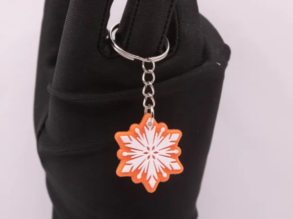 Porte-clés Flocon Orange et Blanc en Plastique Résistant