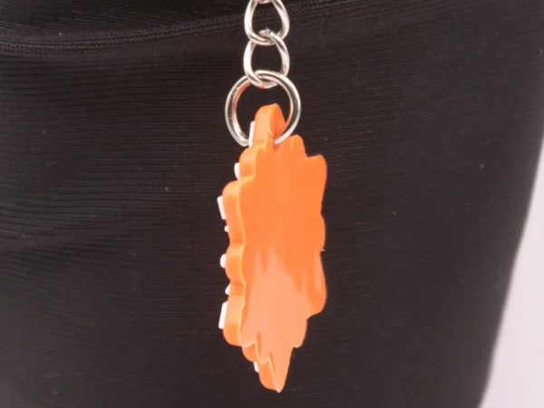 Porte-clés Flocon Orange et Blanc en Plastique Résistant