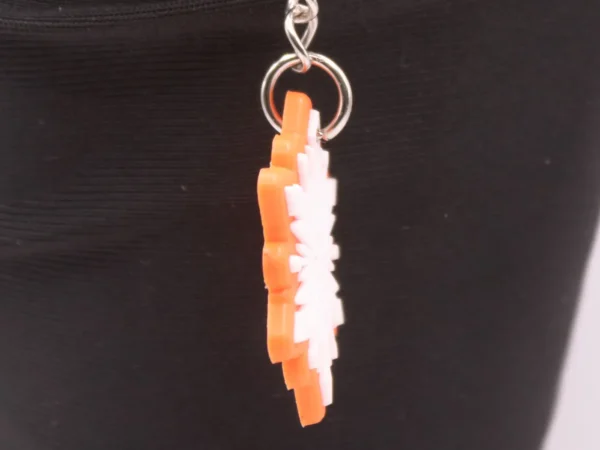 Porte-clés Flocon Orange et Blanc en Plastique Résistant