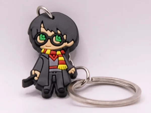 Porte-clés Harry Potter et sa baguette magique en plastique blanc