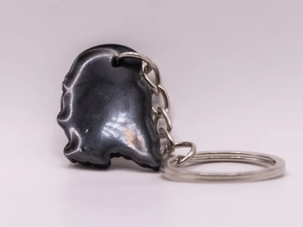 Porte-clés Harry Potter : Hedwige et son enveloppe, un accessoire magique en plastique blanc
