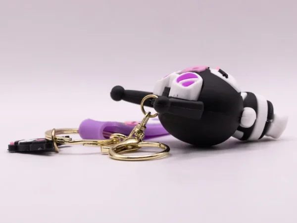 Porte-clés Kuromi violet à lunettes : Accessoire kawaii et stylé