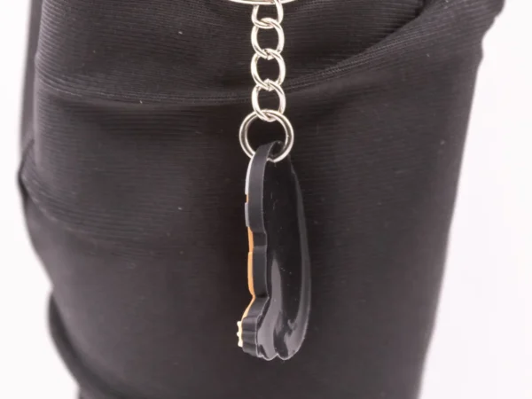 Porte-clés Paresseux Casqué: Accessoire Fun et Original en Plastique