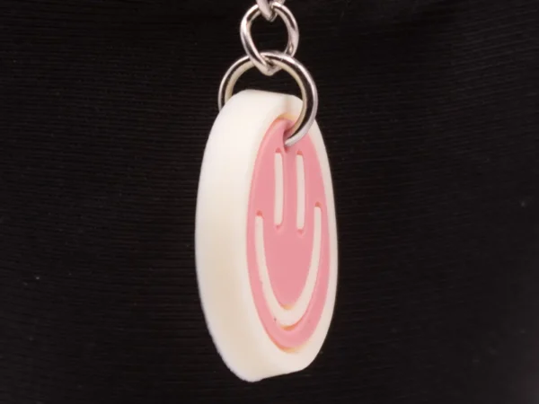 Porte-clés Smiley Rose et Blanc - Accessoire Mode Sourire