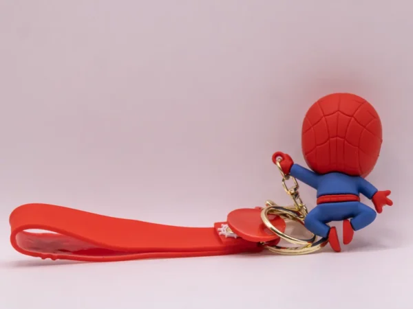 Porte-clés Spider-Man en plastique rouge, posture saut dynamique