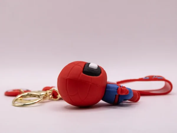 Porte-clés Spider-Man en plastique rouge, posture saut dynamique