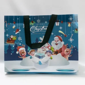 Sac cadeau de Noël bleu décoré de joyeux personnages festifs